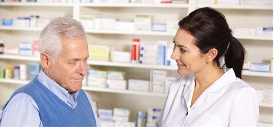 Pharmacist and patient talking